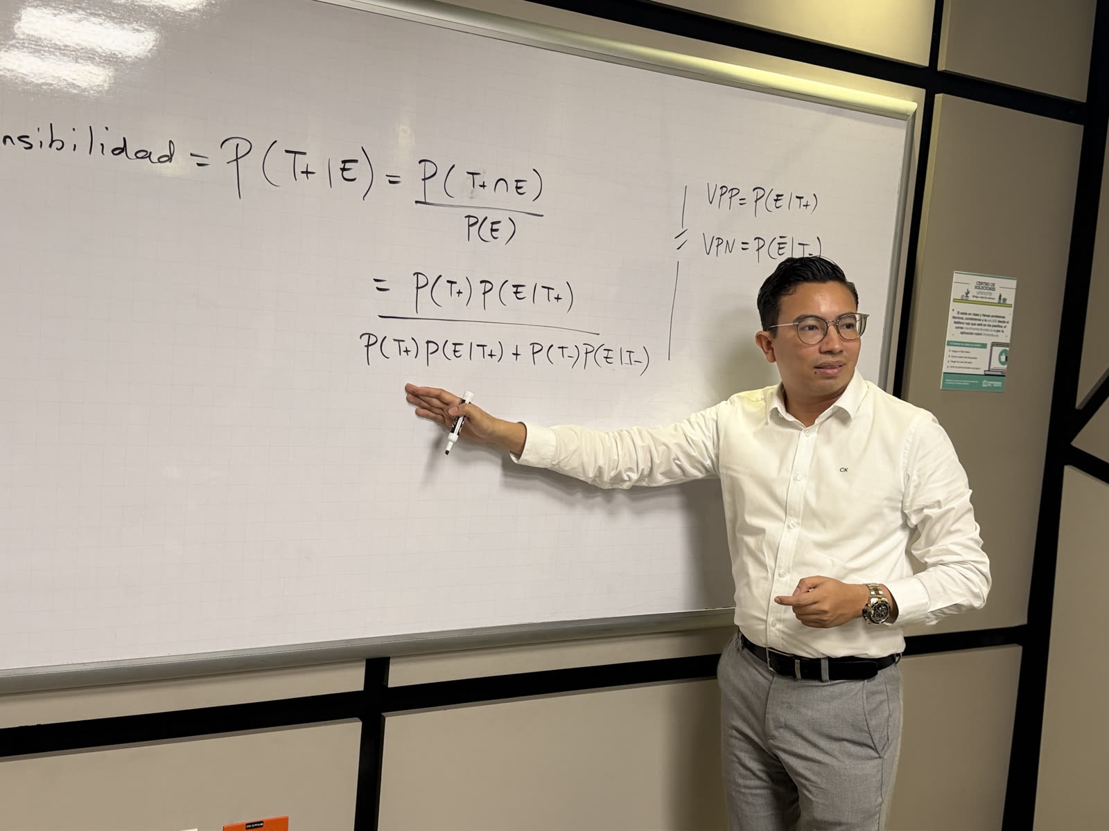 Luis Ángel Anillo presenting research at UNAD, alongside the Minciencias logo